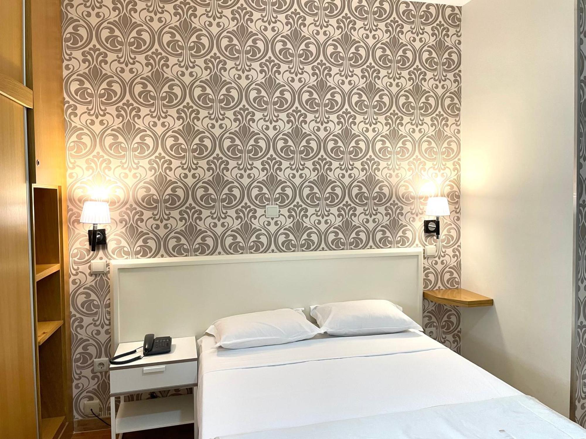 Quarto Família (4 Adultos)