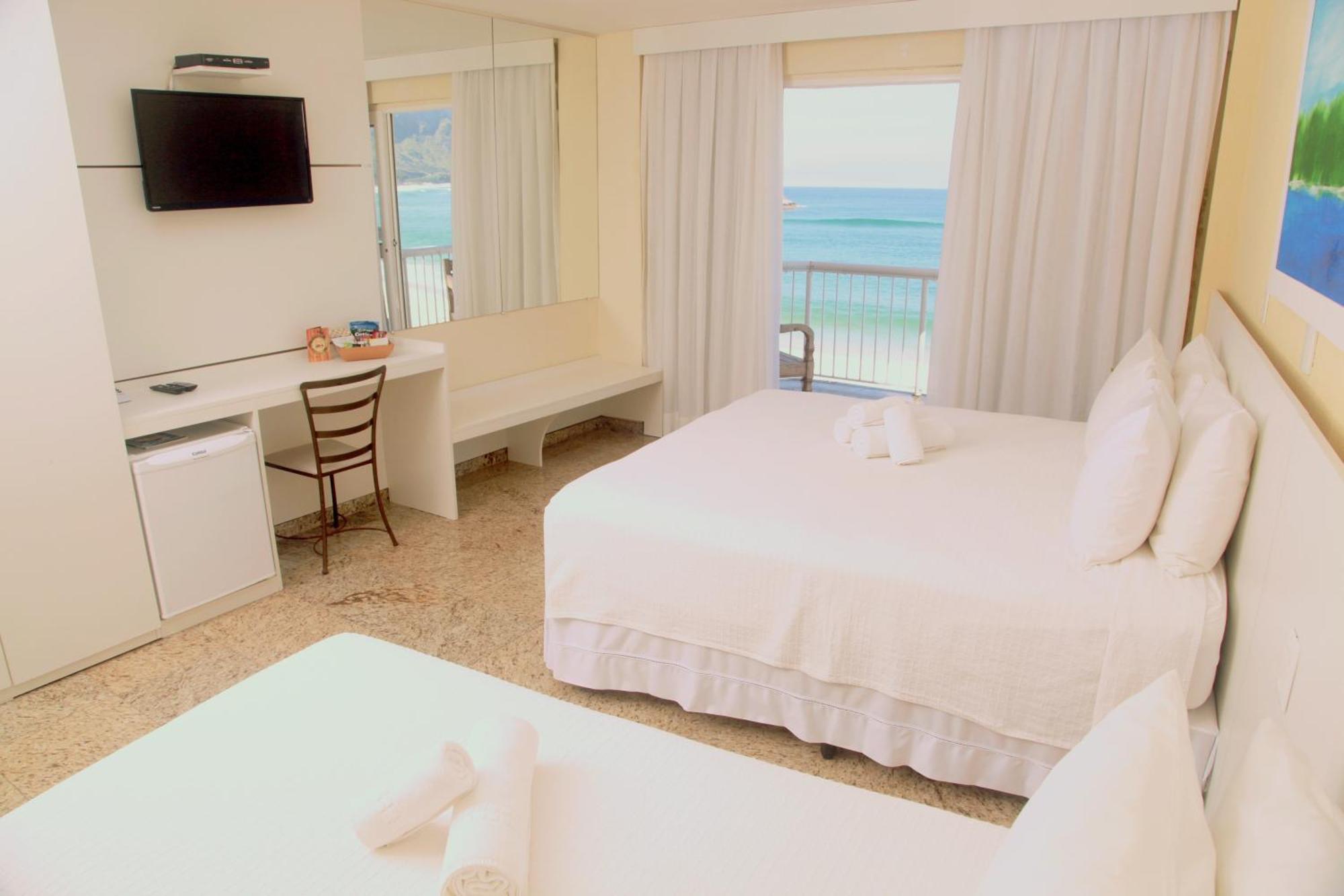 Quarto Quádruplo com Vista do Mar.