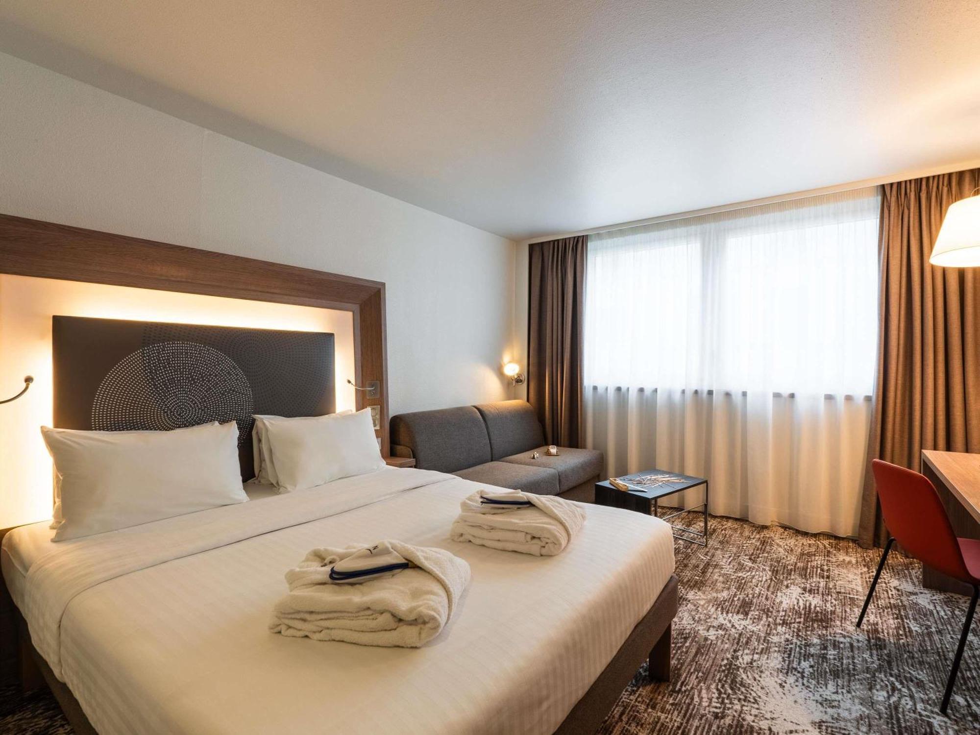 Camera Quadrupla Executive con Letto Queen-Size e Divano-Letto Matrimoniale